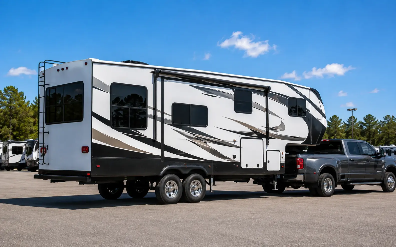 Fifth wheel RV connected to a dually truck — RV Dealz fifth wheel dealer pricing nationwide