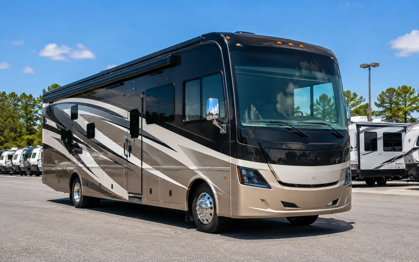 Class A motorhome parked on an independent dealer lot — RV Dealz nationwide RV price matching